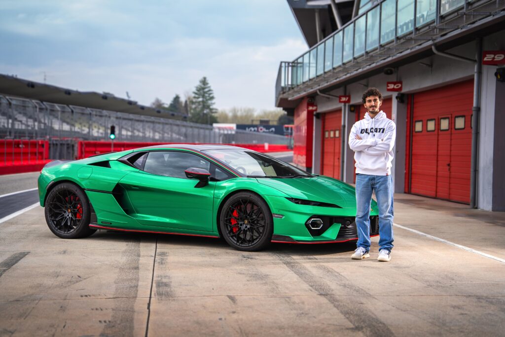 Francesco ‘Pecco’ Bagnaia infront of car