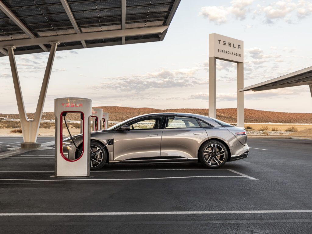 2026 Lucid being charged at a Tesla charging station with NACS