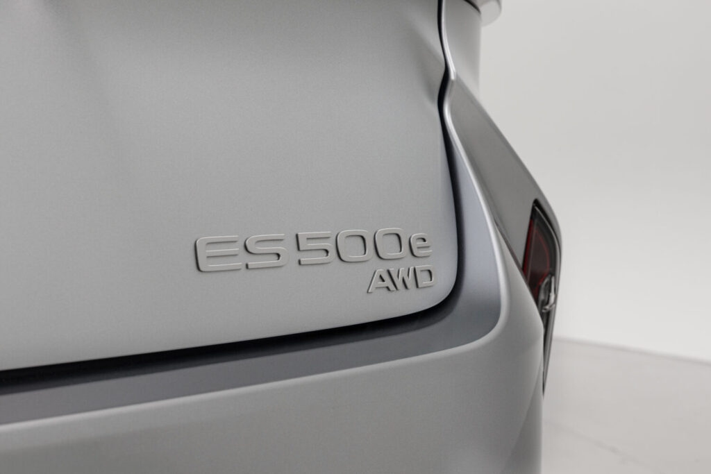 Badge view of the 2026 Lexus ES 500 E all-wheel-drive