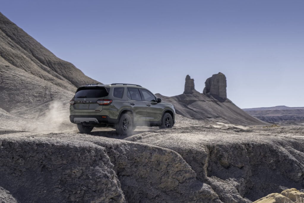 2026 Honda Pilot TrailSport driving through dust