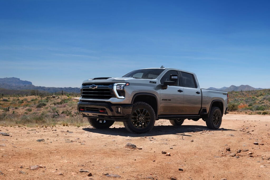 2025 Chevrolet Silverado HD Trail Boss parked in a desert setting