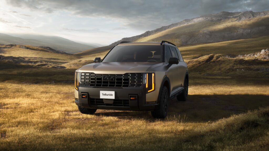 Front three-quarter angle of the 2027 Kia Telluride X – Pro in an open field
