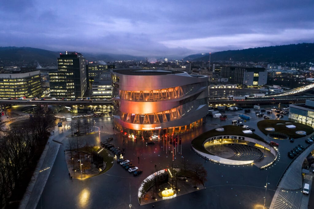 Mercedes-Benz Headquarters shown at night all lit-up in Stuttgart, Germany.