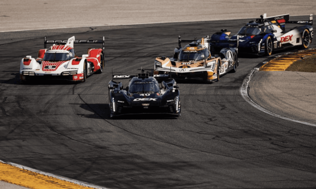 The No. 40 Wayne Taylor Racing Cadillac of Jordan Taylor, Louis Deletraz and Colton Herta battle fellow GTP competitors during the Rolex 24 at Daytona.