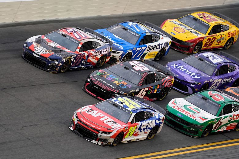 Tyler Reddick in the mix with other cars as they go three wide on track