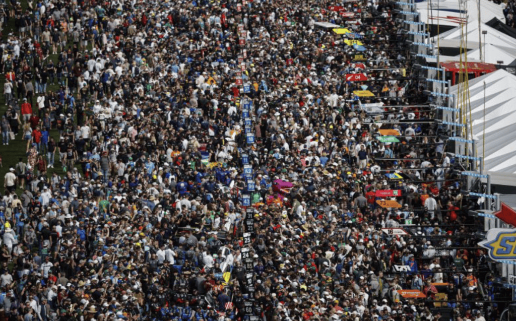 Thousands of people crowded together for the 2026 IMSA Rolex 24 at Daytona Grid Walk