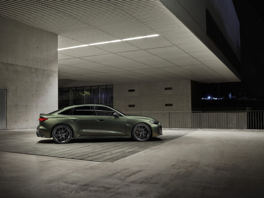 2027 Audi RS 5 Sedan at night under lights in a building
