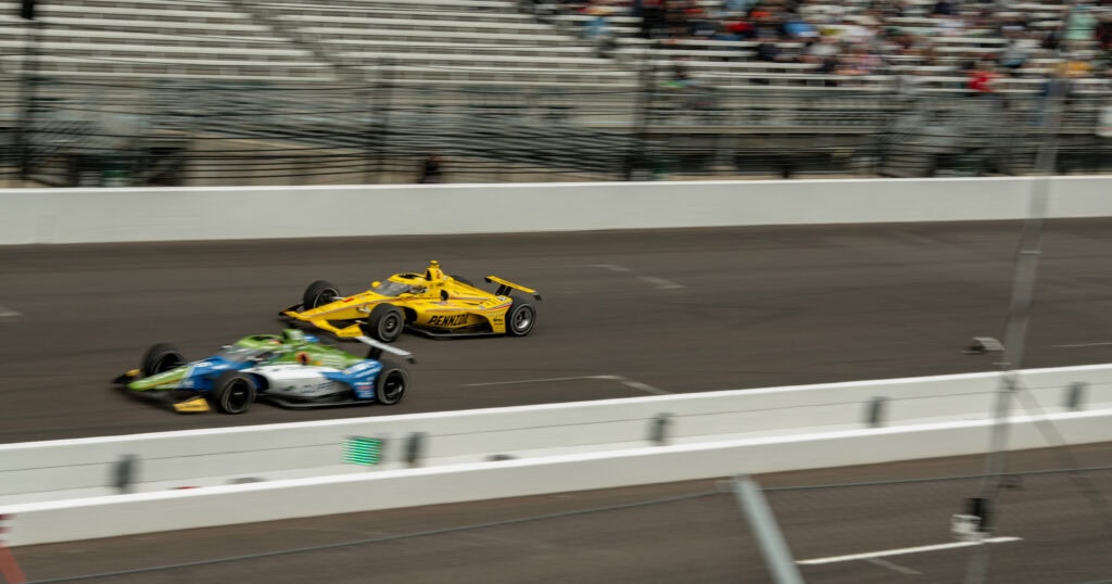 Two cars at the Indy 500 during Final Practice
