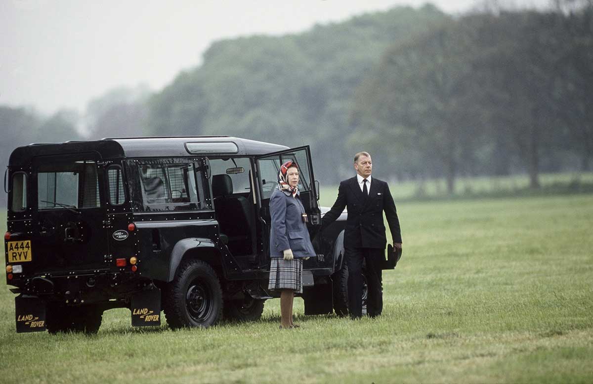 Queen Elizabeth with her Land Rover in Scotland